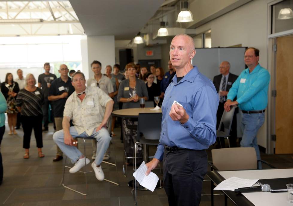 Kevin Ricco, director of the Muskegon Innovation Hub and CoLaunch, addresses participants during an open house in June.